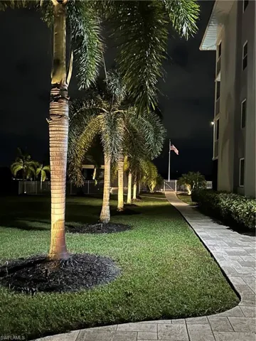 View of home's community featuring a lawn