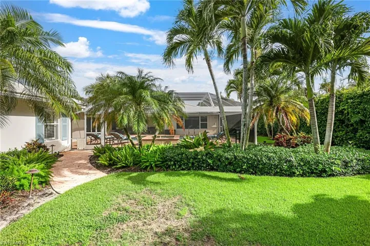 View of yard featuring a lanai