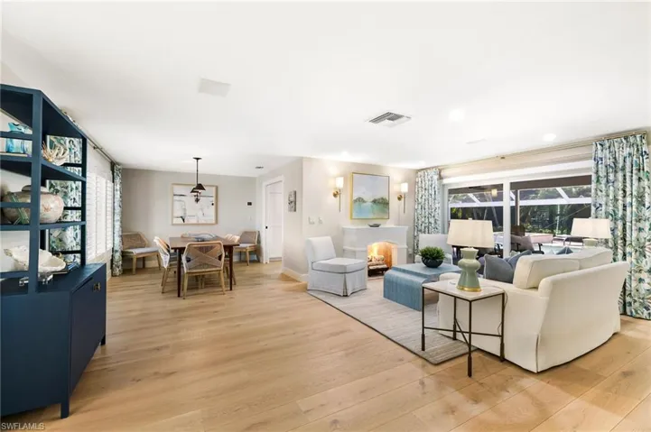 Living room and Dining room featuring white oak flooring throughout the home