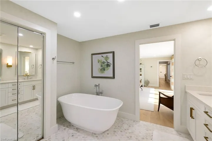 Primary bathroom separate soaking tub