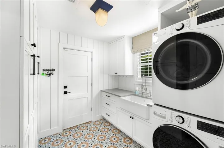 LG Stacked washer/dryer and laundry sink in main house