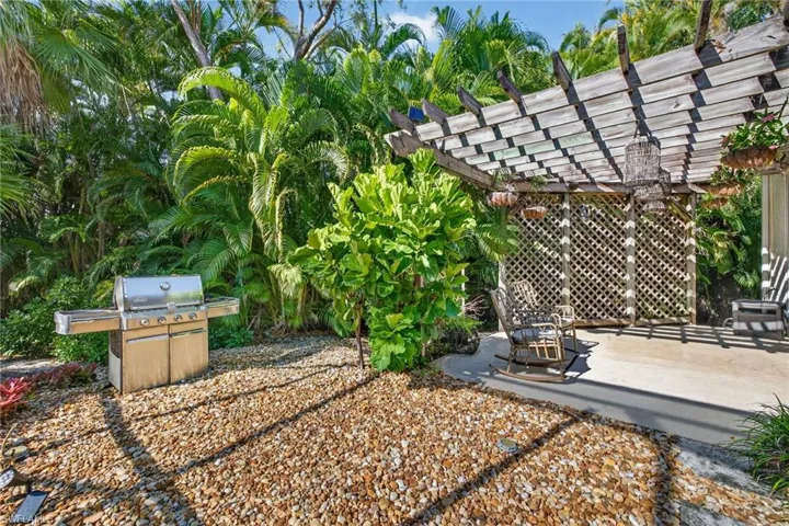 View of yard featuring a pergola and a patio area