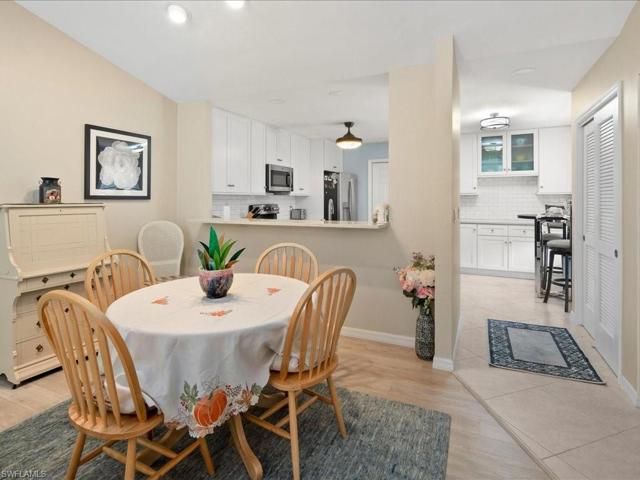 A large pass through over the kitchen sink allows for ease of entertaining.