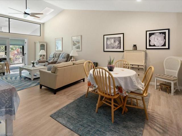 Beautiful luxury vinyl flooring, vaulted ceilings with skylights (2017) and sun shades on the skylights enhance the spacious living area.
