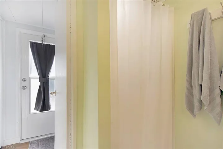 Bathroom featuring  wood-style floors