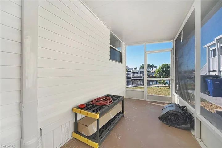 Screened in lanai with a water view