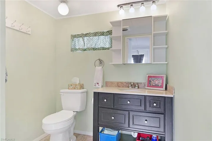 Bathroom with vanity and toilet