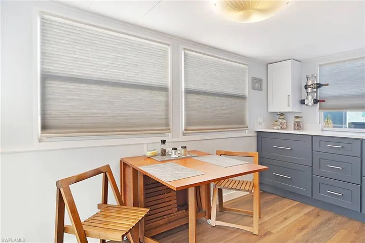 Dining area featuring light wood-style floors