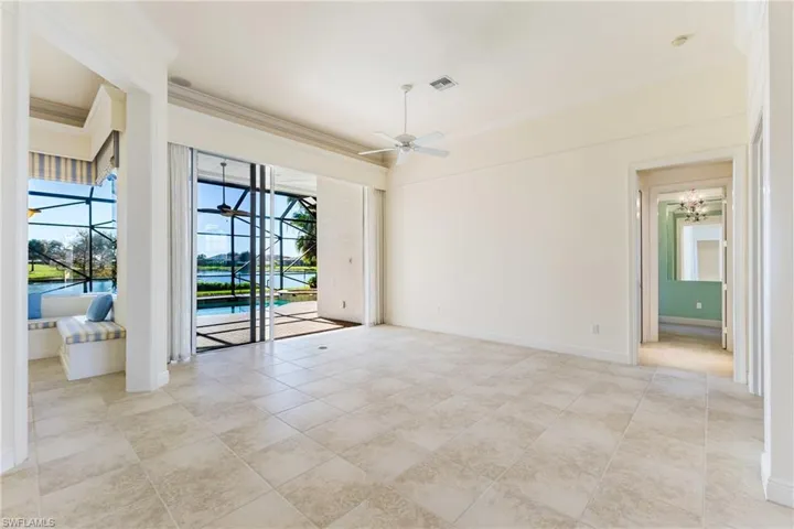 Unfurnished living room, ornamental molding, and ceiling fan