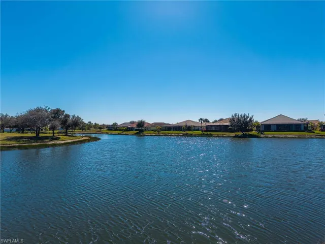 Water view with nearby suburban area