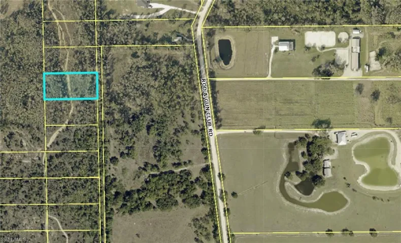 Aerial map of property and surrounding area featuring property boundaries highlighted