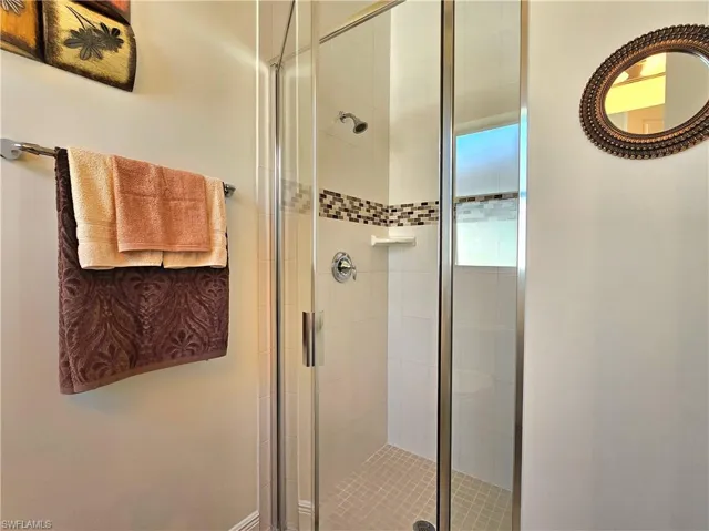 Bathroom featuring a shower stall