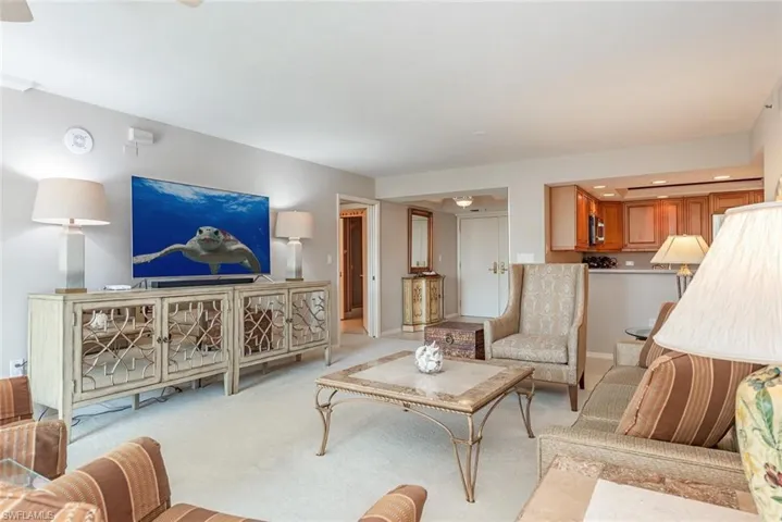 Living area featuring carpet flooring