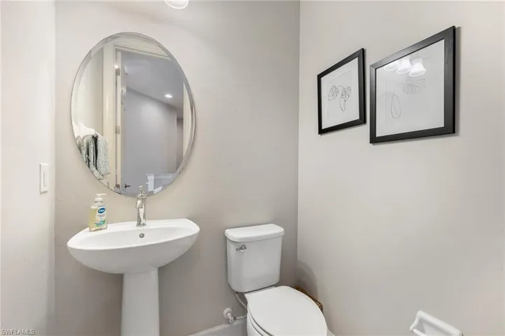 Half bathroom featuring toilet