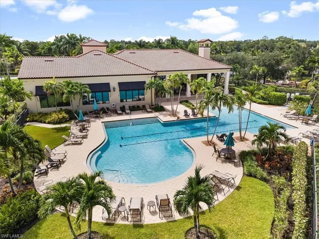 Community pool featuring a patio