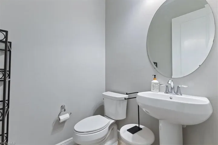 Bathroom with toilet and a sink