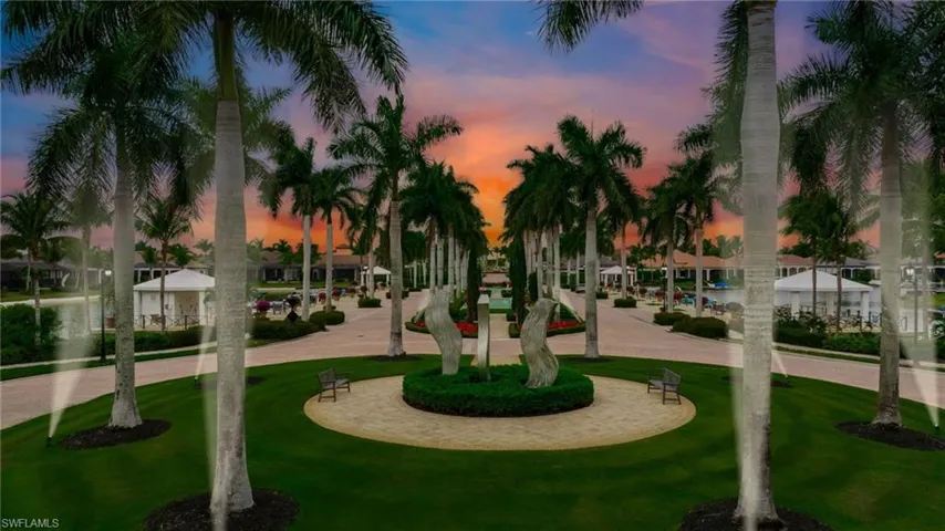 View of property's community with a yard
