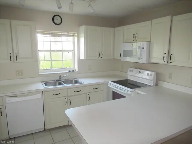 441  Quail Forest  BLVD, Naples, FL 34105