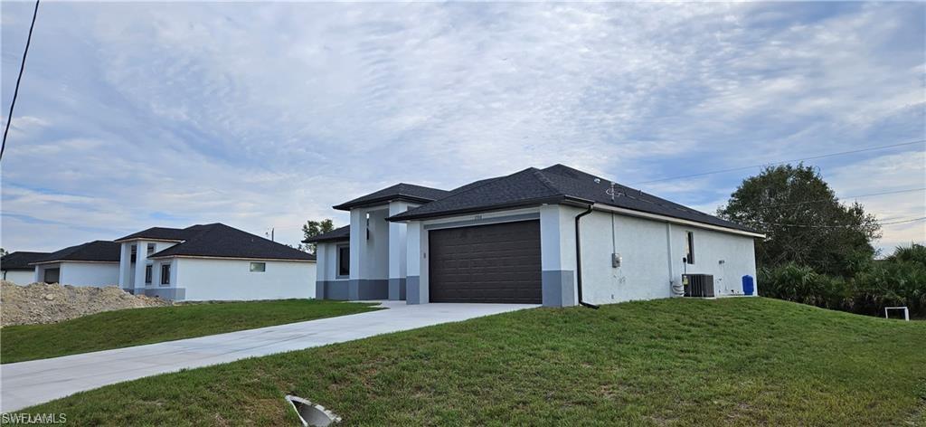 1215  Hibiscus  AVE, LEHIGH ACRES, FL 33972