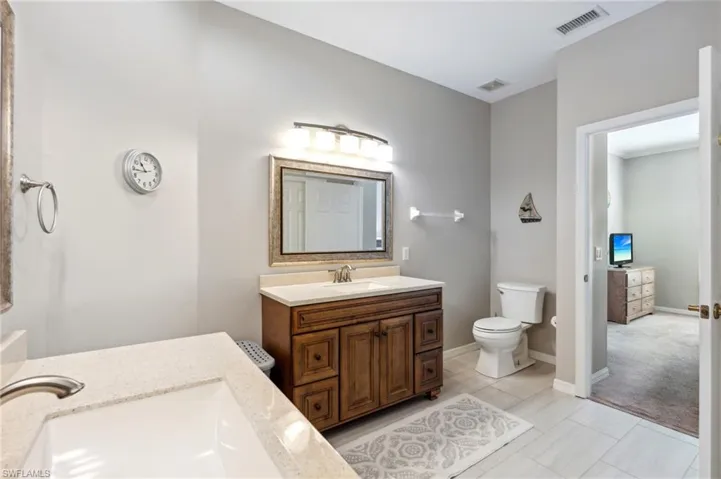 Bathroom with vanity and toilet
