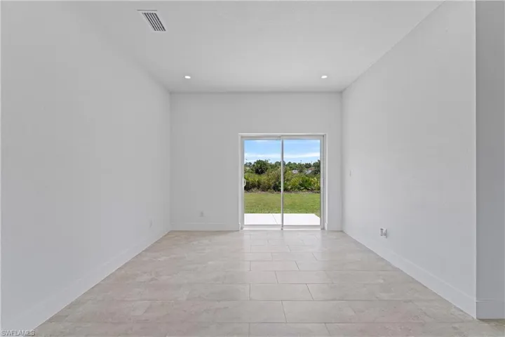 Unfurnished room with recessed lighting
