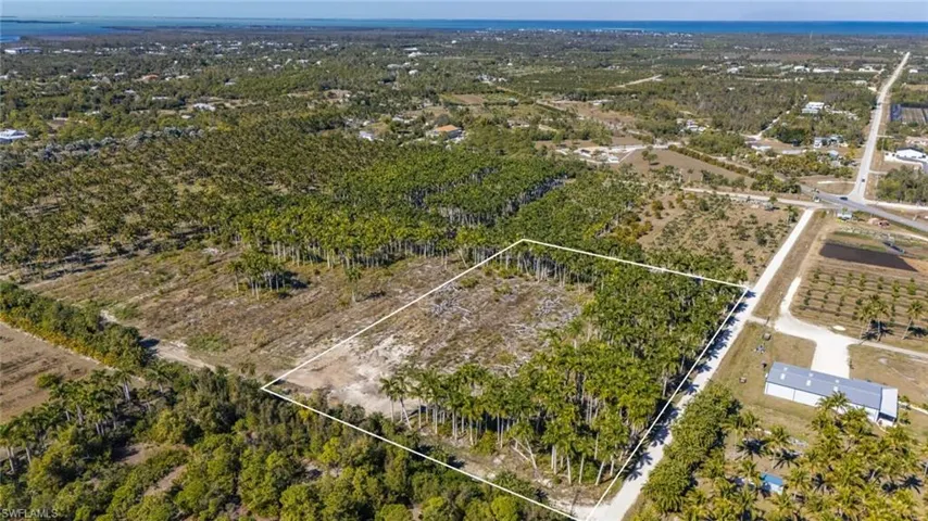 Overview of rural landscape featuring property parcel outlined
