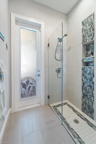 Pool Bathroom with a stall shower