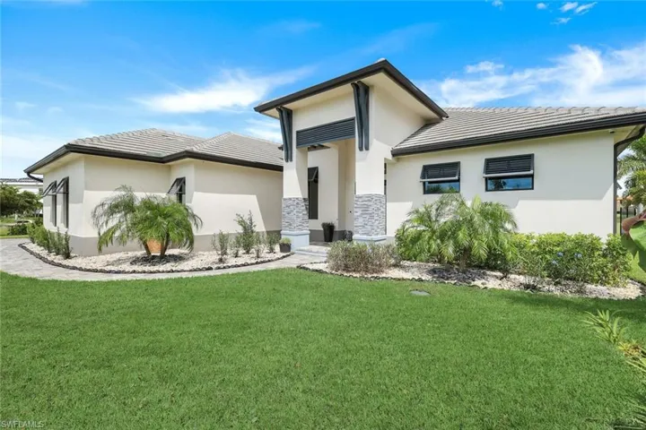 View of front of home with a front yard