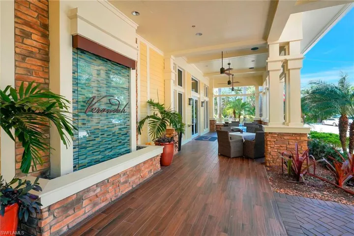 View of patio featuring covered porch and ceiling fan
