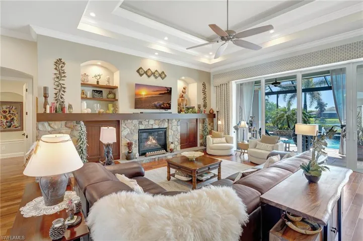 Great room, stone fire place, wood cabinetry