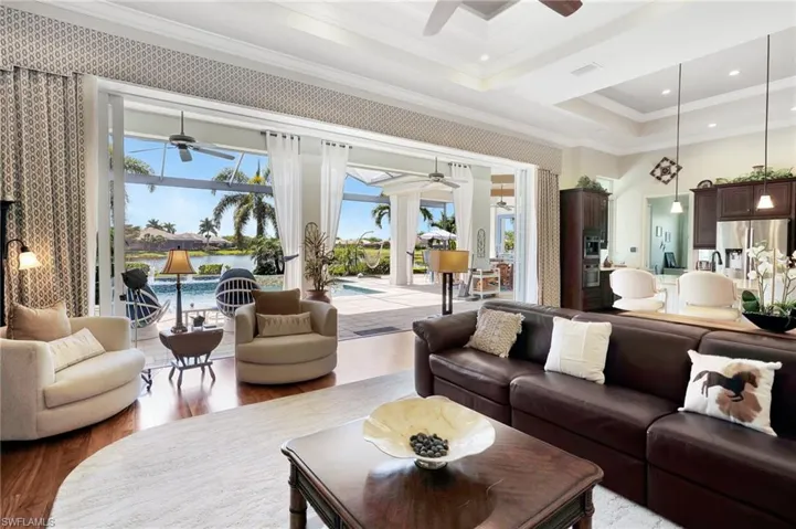Great room  with opened pocket doors to the lanai