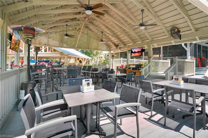 View of patio / terrace featuring outdoor dining area and ceiling fan