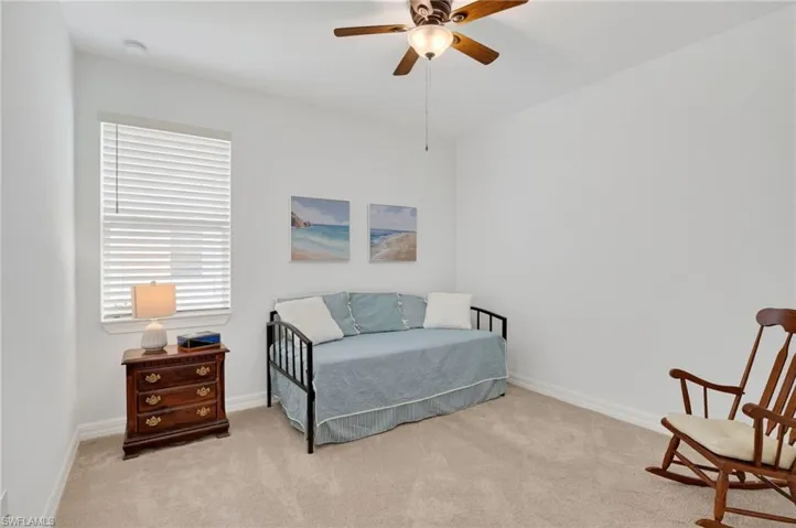 Step into the Spacious Bedroom, where cozy carpet floors invite you to relax and unwind, all while a gentle ceiling fan creates a soothing breeze. 4 bedrooms in total