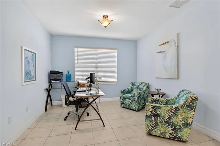 Discover a versatile flex room, perfectly suited for an elegant dining area or a productive home office, adapting to your lifestyle needs with style and functionality!