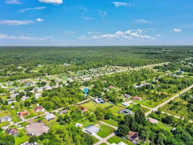 Bird's eye view with a wooded view