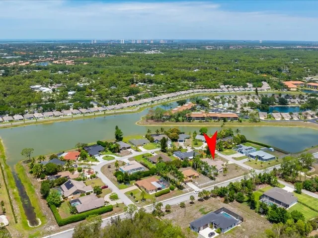 Aerial perspective showcasing the residential area with a prominent body of water