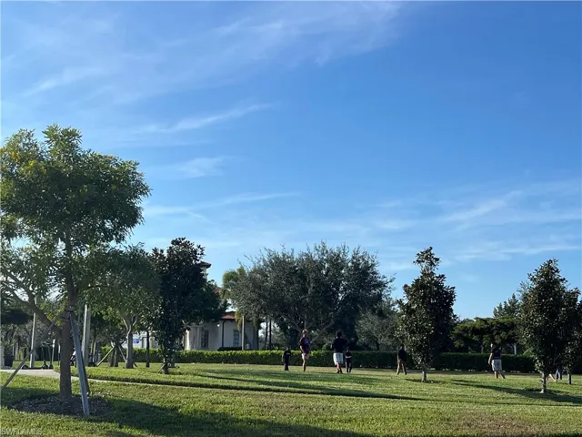 View of community with a yard