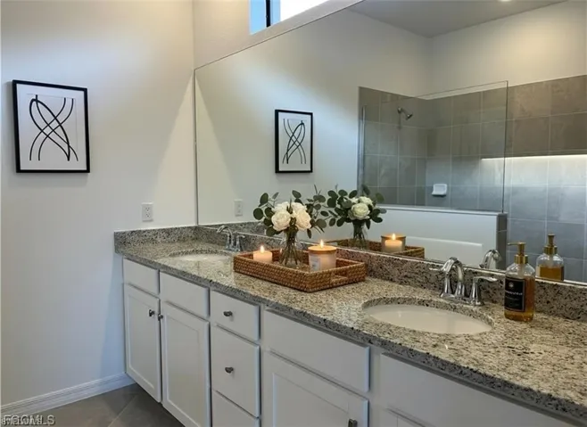 Bathroom with a walk in shower and double vanity