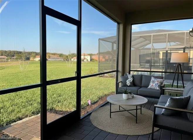 Covered and Screened Lanai with lake view