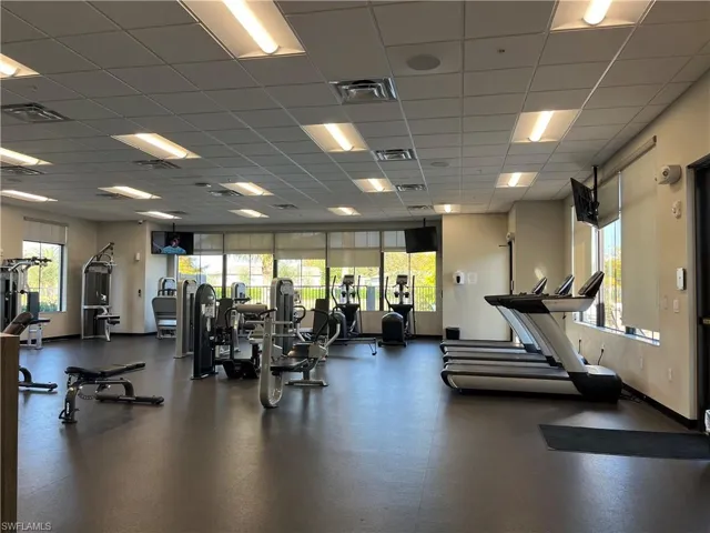 Workout area featuring a paneled ceiling