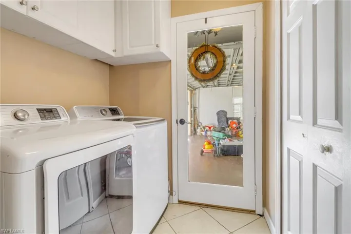 Laundry room off the kitchen which leads you to the 2 car garage. Ample storage space!