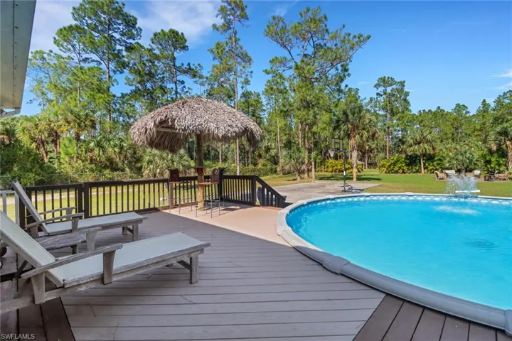 Beautiful pool with new solid composite decking that is durable, low maintenance, resistant to moisture, insects, and stains, and environmentally friendly
