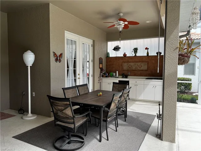 Outdoor kitchen, grill and plenty of table space