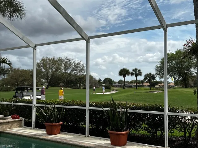 Screened lanai with view of the 8th green
