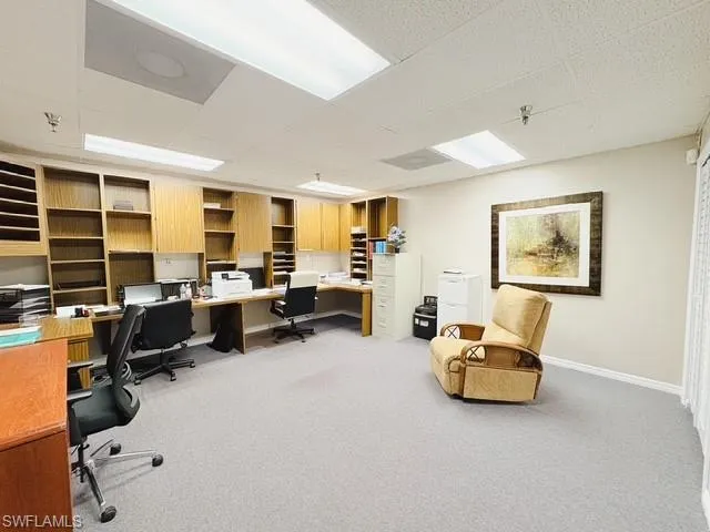 Office space featuring a paneled ceiling