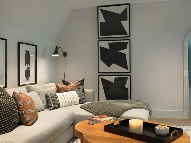 Living room with lofted ceiling
