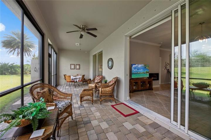 Oversized lanai with triple sliders into Great Room.