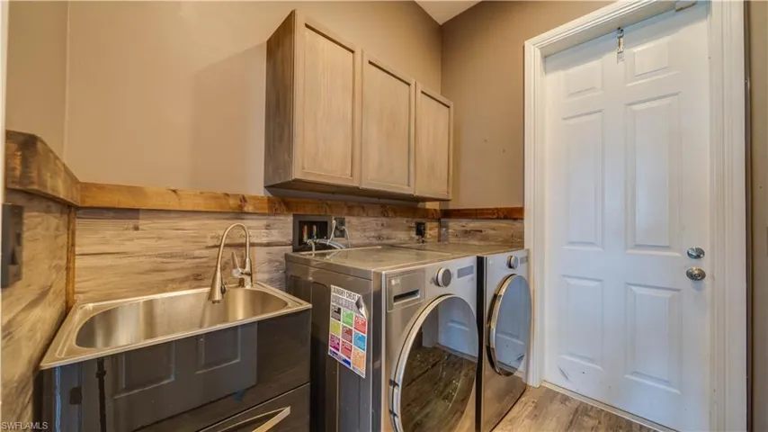 Laundry Room with Utility sink & large closet