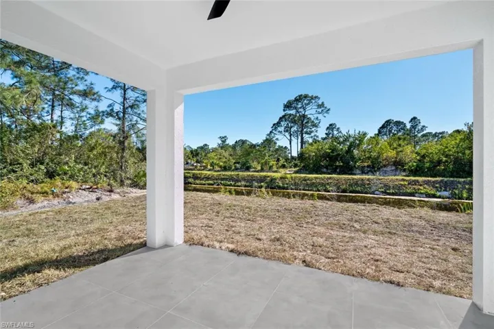 View of patio / terrace with view of scattered trees