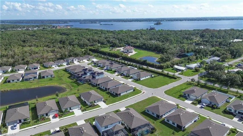 Bird's eye view featuring a residential view and a water view